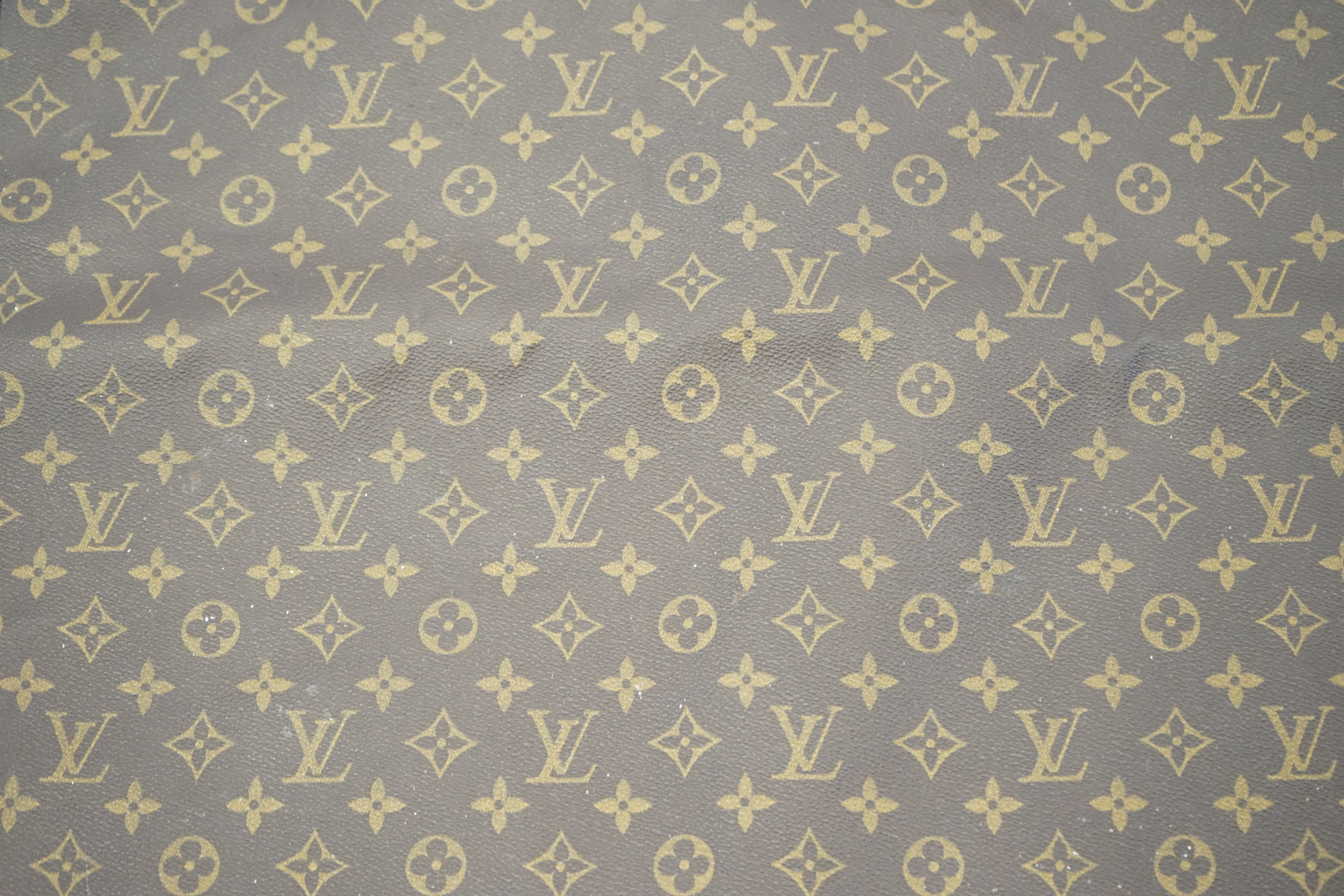 A Louis Vuitton special order folio case width 90cm, depth 4cm, height 63cm